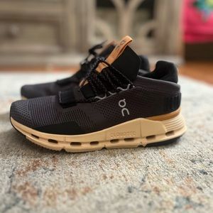 On clouds: cloudtec size 6.5 black with orange/ peach detail